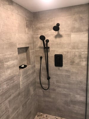 Contemporary Spa  walk in  shower, black shower accessories,River rock floor tile and tile plank walls, Stony brook NY